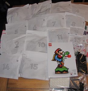 Image of 15 Lego bags and instruction manual.