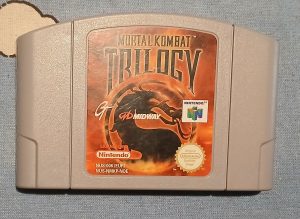 Image of the front of a Mortal Combat Trilogy N64 cart.